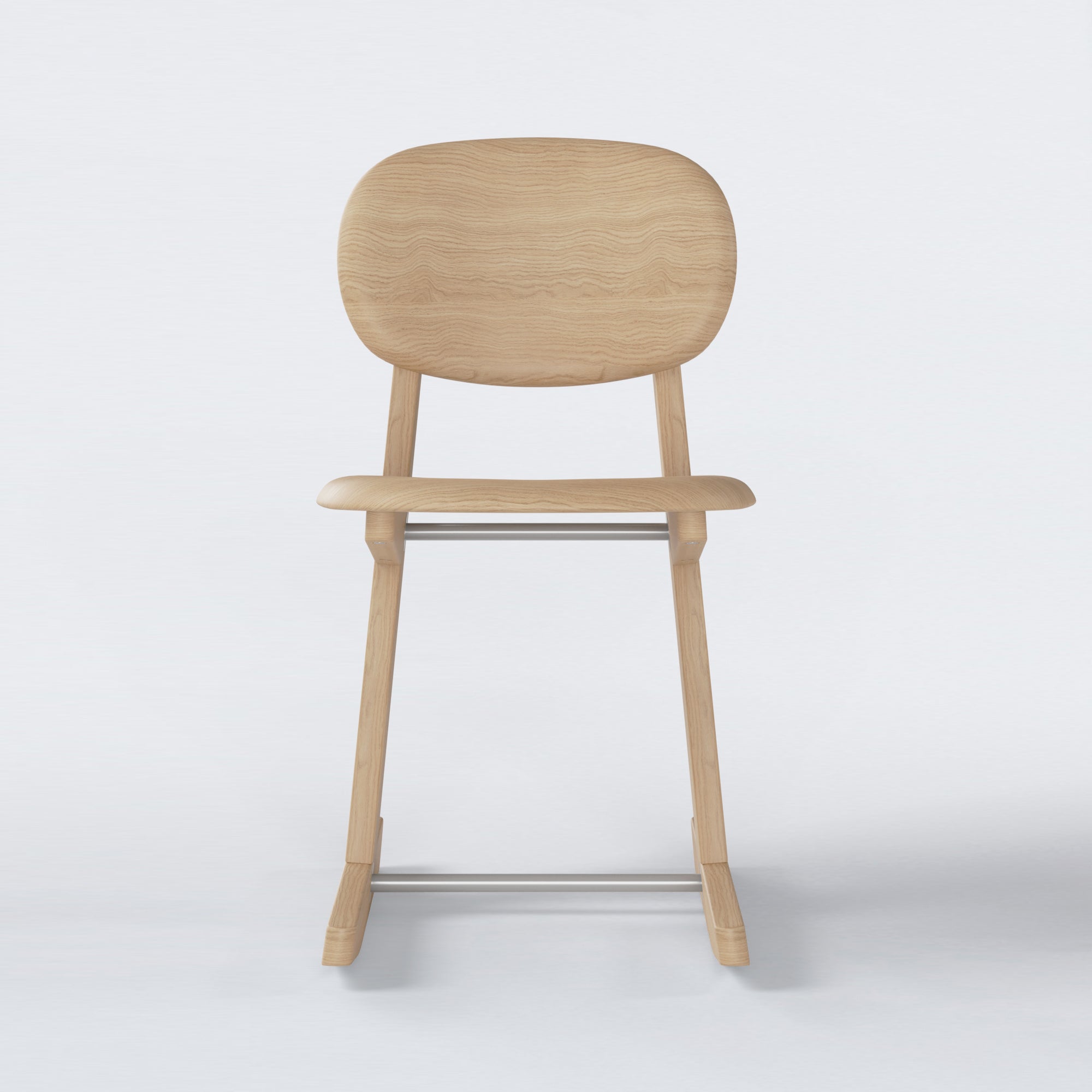 KufenKarl Office Tipforward KD in Oak Nature with off-white grey metal frame – a minimalist chair with soft, contemporary contrasts.