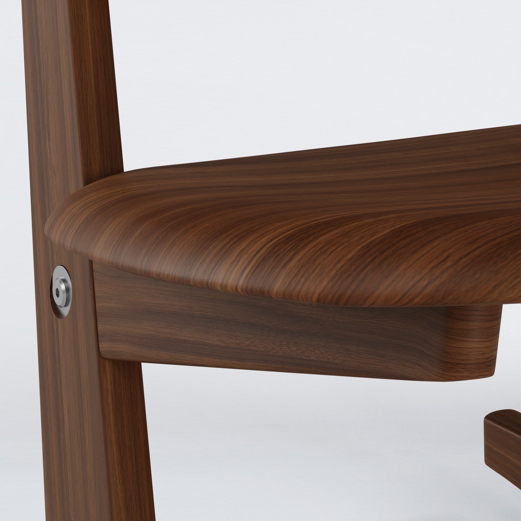Close-up of KufenKarl Rocking Chair KD in walnut, showing fine craftsmanship, wood texture, and assembly details.