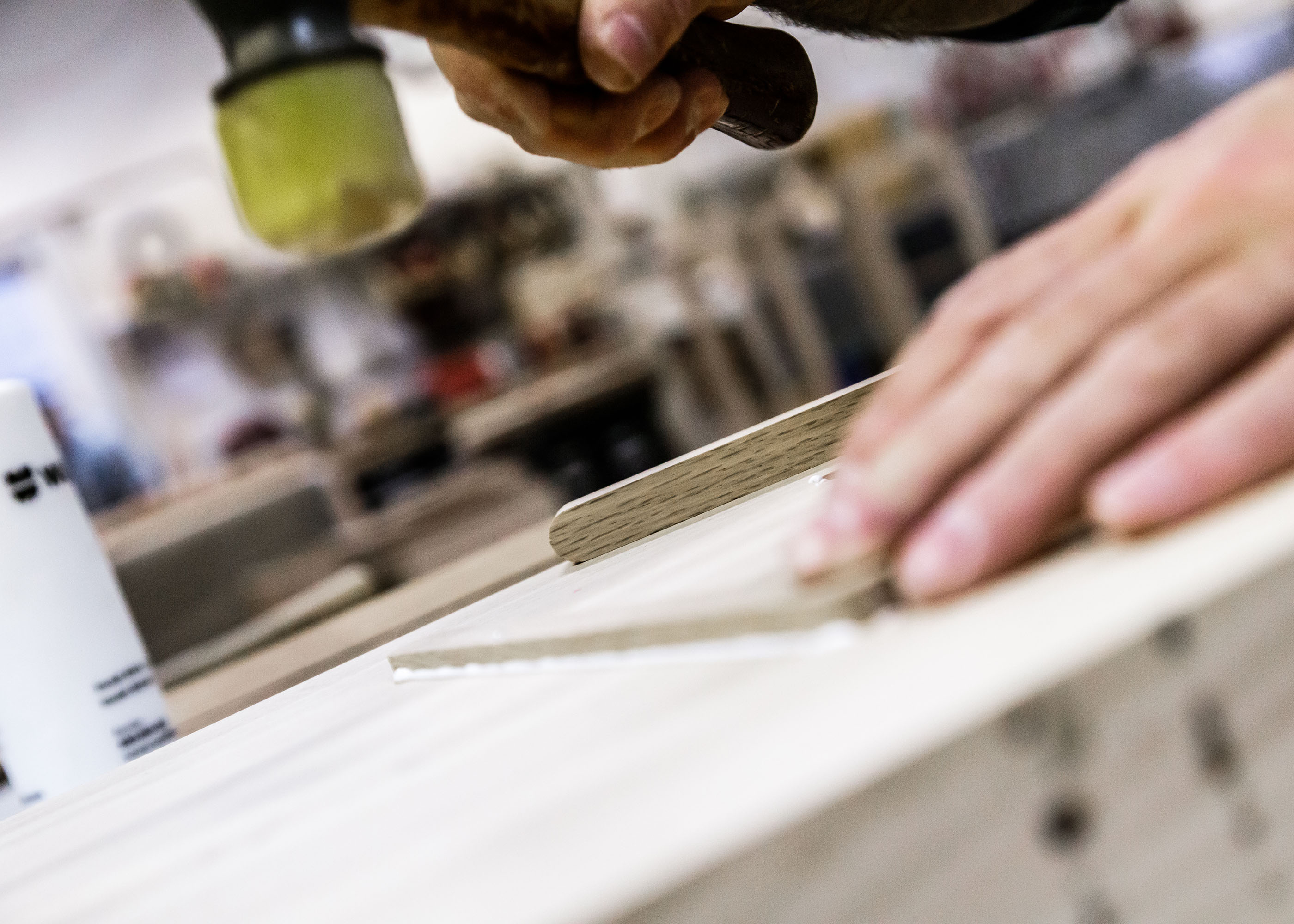 Detailed view of woodworking in progress at Collect Studio.